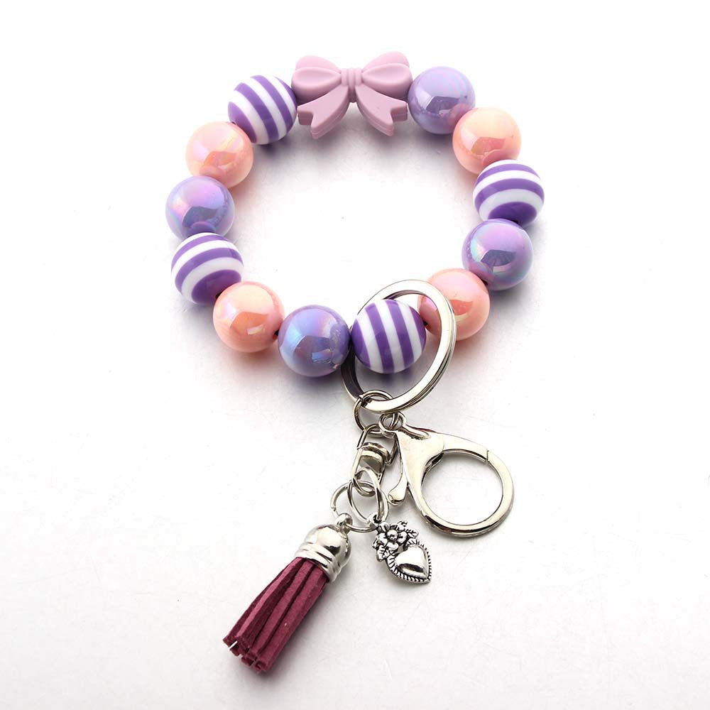 Wholesale Tassel Dragonfly Bull Head Lion Love Angel Acrylic Wrist Keychain